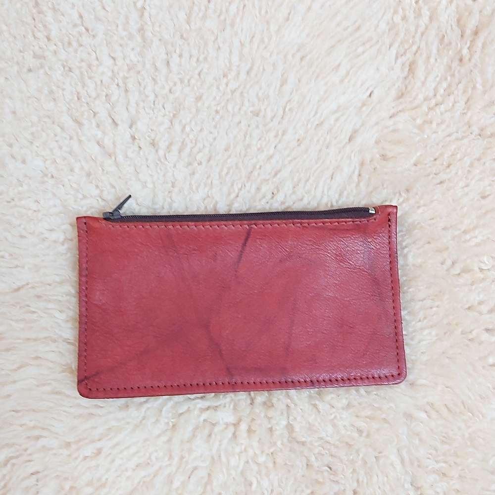 Dual zippered red leather wallet pouch